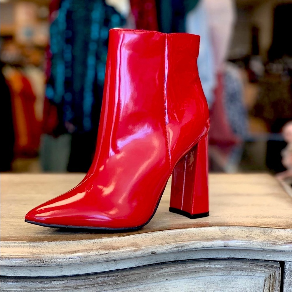 Red heel booties, size 6.5 only worn for a few hours, in perfect condition